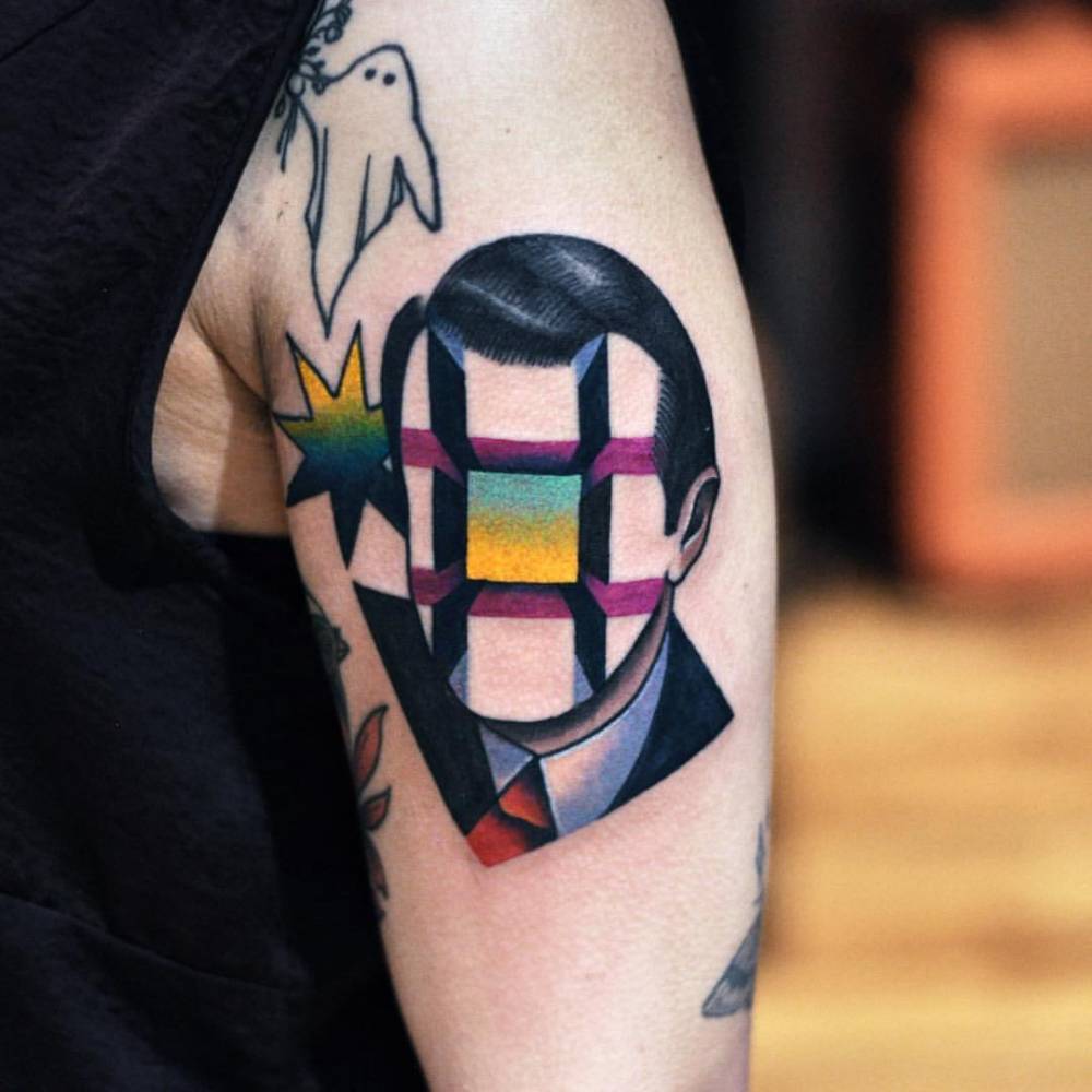Cubes face tattoo by david côté