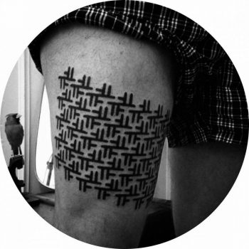 Custom black pattern tattoo