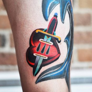 Dagger pierced heart tatto by david côté