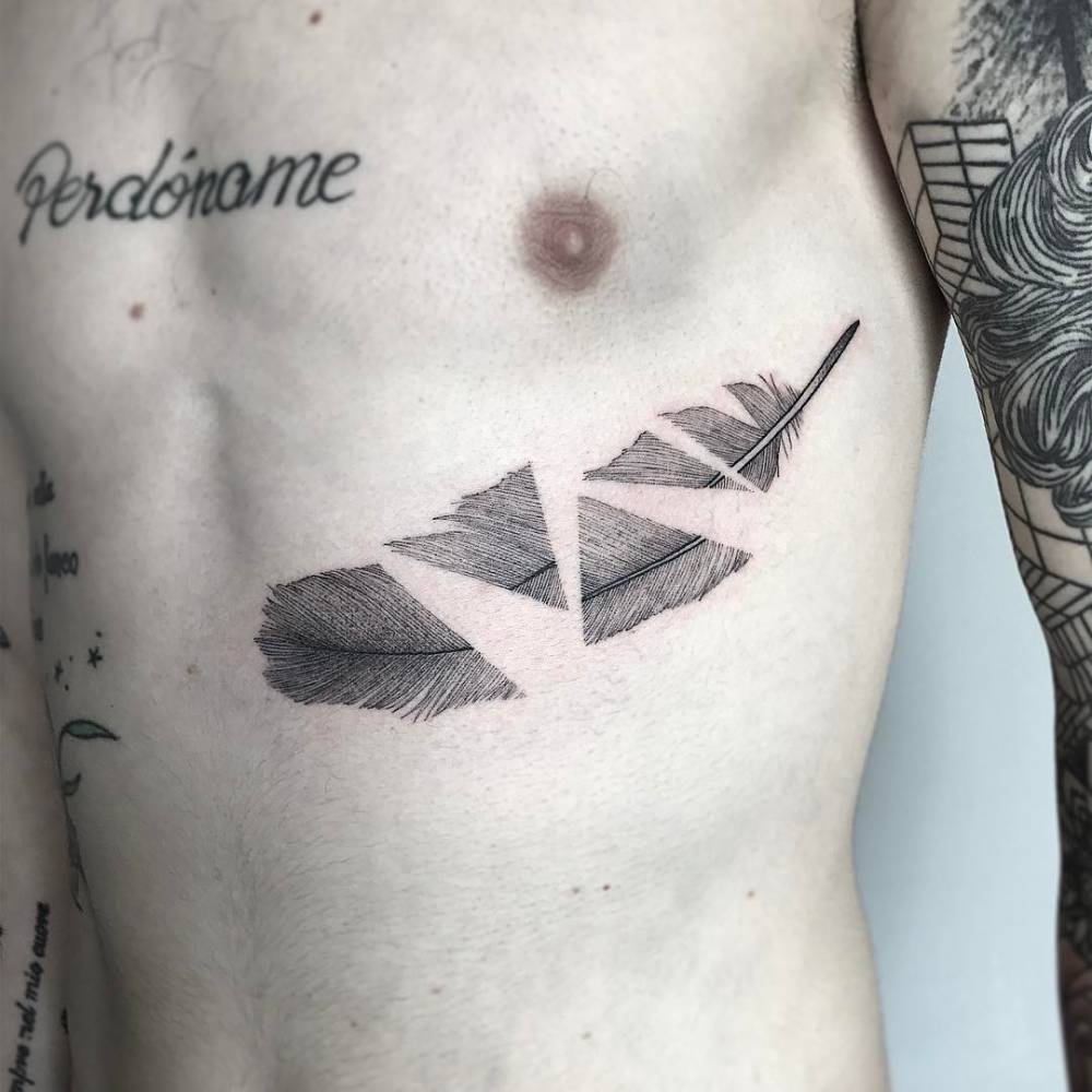 Deconstructed feather tattoo by michele volpi