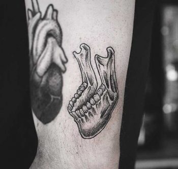 Dot work mandible tattoo by yi postyism
