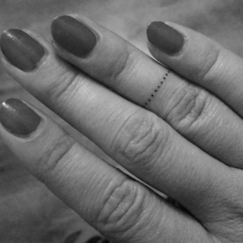 Dotted ring tattoo