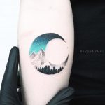 Double exposure moon tattoo by evgeny mel