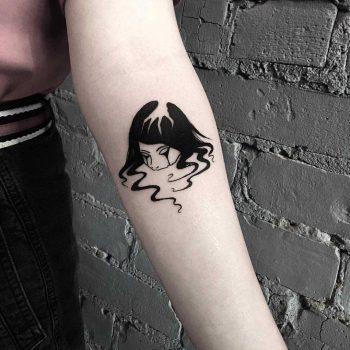 Eerie woman's head tattoo