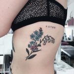 Forget me not and lily of the valley tattoo