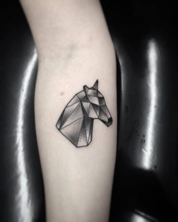 Geometrical horse head tattoo