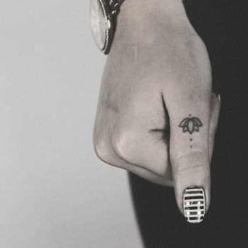 Hand poked lotus tattoo by lindsay april