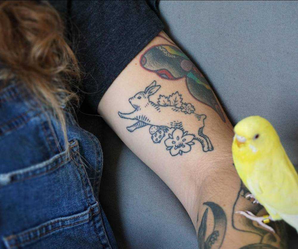 Hand poked bunny tattoo 