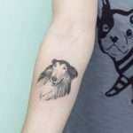 Hand poked collie tattoo