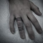 Hand poked minimalist line tattoos
