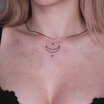 Hand poked moon tattoo on the clavicle