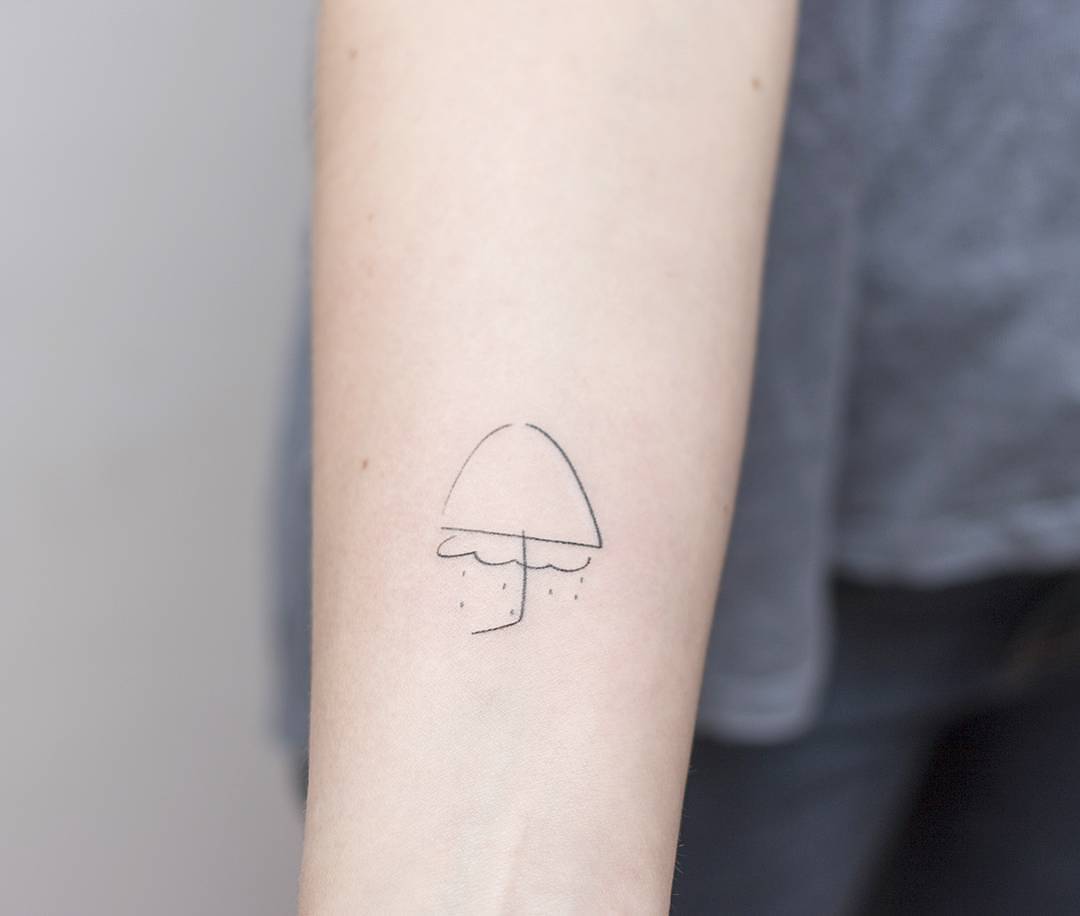 Hand poked umbrella tattoo by ponto tattoo
