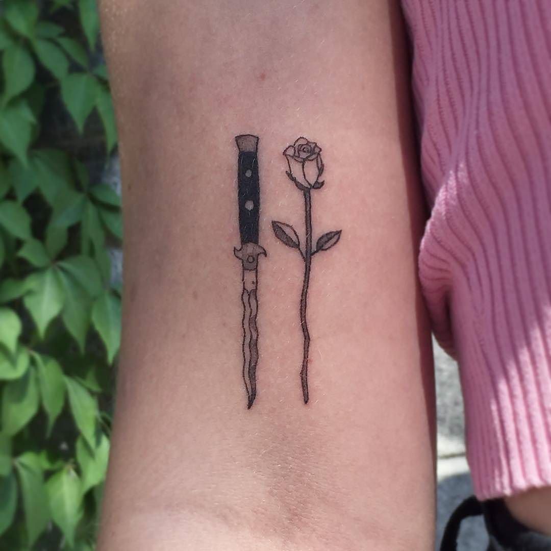 Handpoked knife and rose tattoo by alex royce
