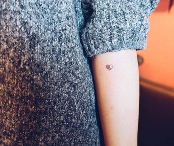 Heart shaped peace symbol tattoo