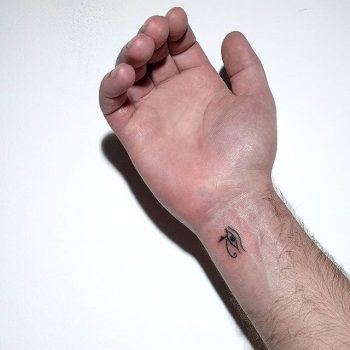 Horus eye tattoo on the wrist