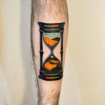 Hourglass tattoo on the left shin