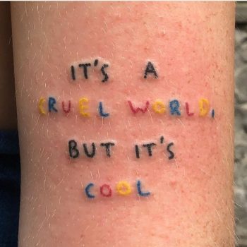 It's a cruel world tattoo