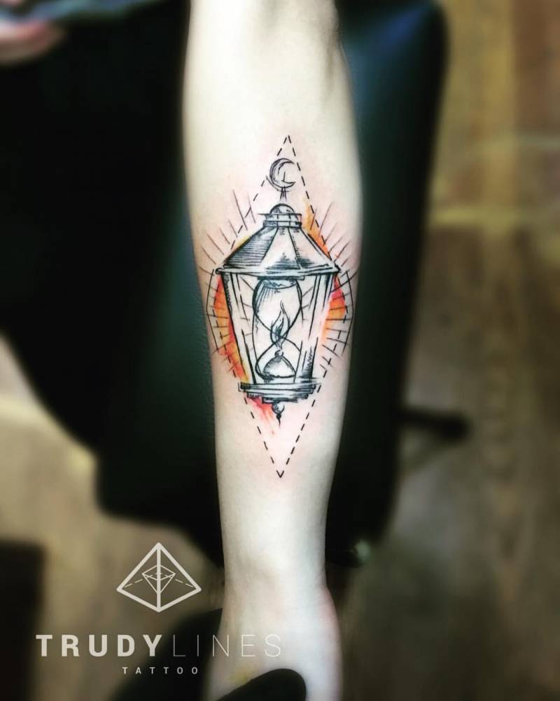 Lantern tattoo on the forearm
