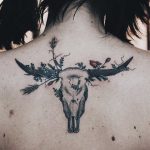 Longhorn skull and wildflowers tattoo