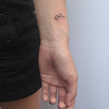 Micro glasses tattoo by lindsay april