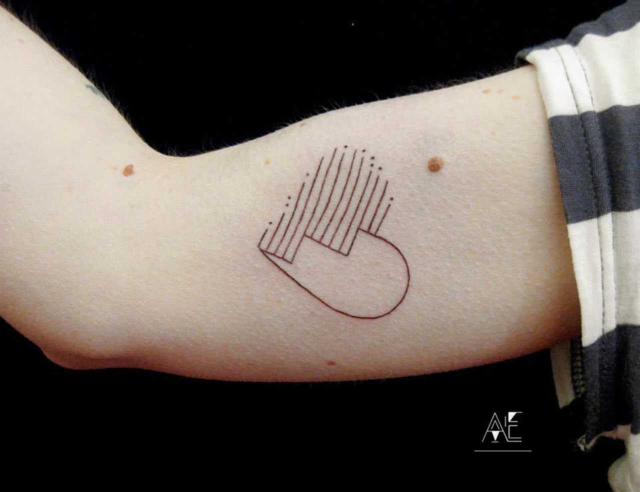 Minimal broken heart tattoo