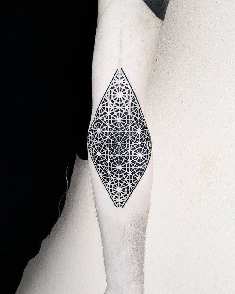 Optical art style rhombus tattoo