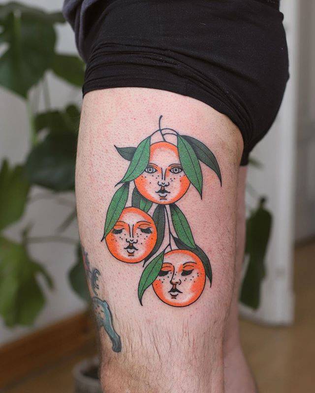 Orange faces tattoo by patryk hilton