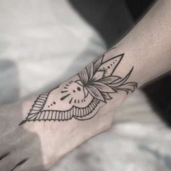 Ornamental foot tattoo by unkle gregory