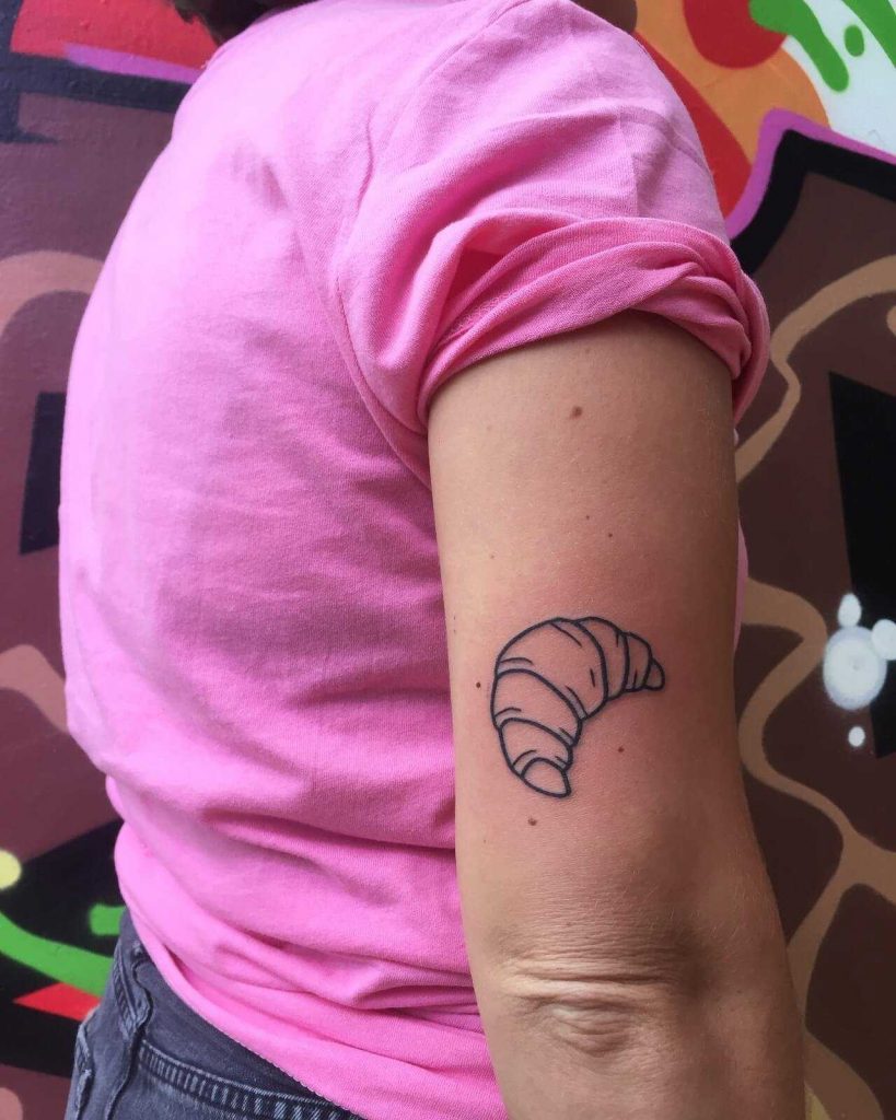 Outline croissant tattoo