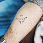 Outline airplane tattoo