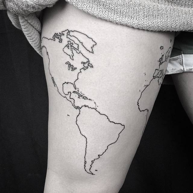 Outline world map tattoo around the thigh