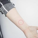 Red circle tattoo by nano ponto