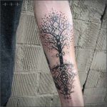 Scandinavian style tree tattoo