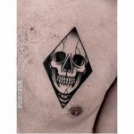 Skull in a rhombus tattoo by ana