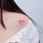 Small pink heart tattoo