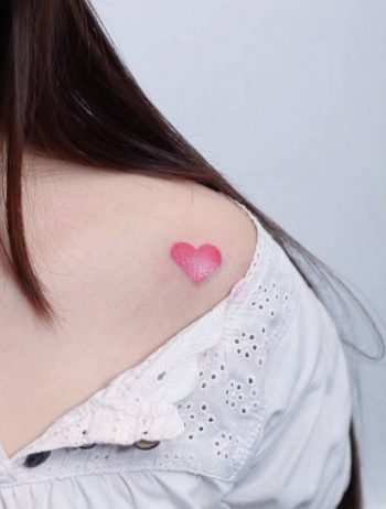 Small pink heart tattoo