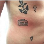 Small tattoos on the rib