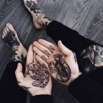 Snake and spider tattoos