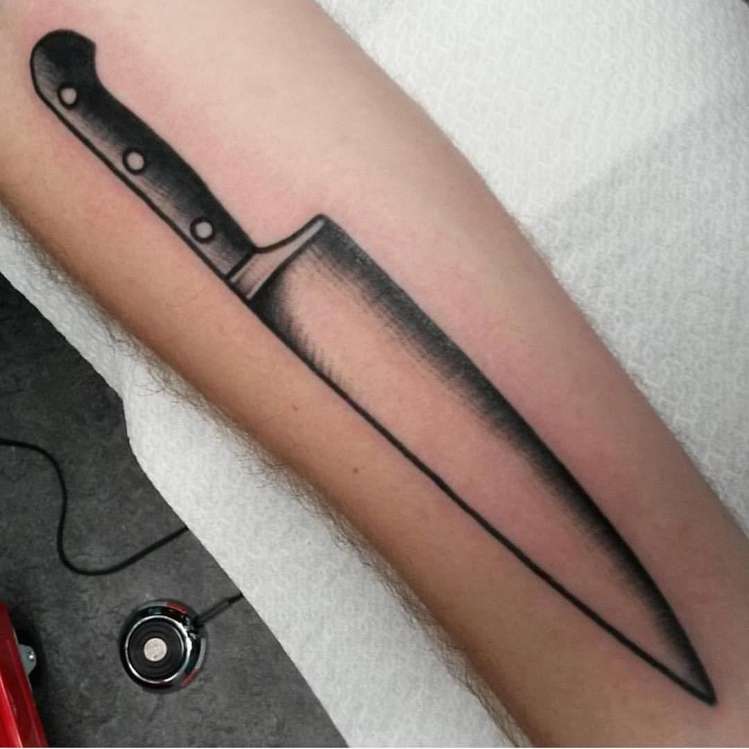 Straight lines chef’s knife tattoo by jeroen van dijk