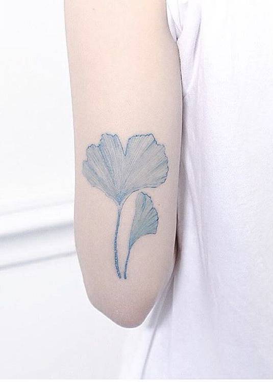 Subtle ginkgo leaf tattoo