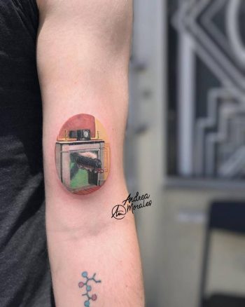 Surrealist train tattoo by andrea morales