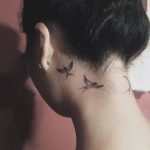 Swallows on the neck