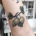 Tiny gooseberry tattoo