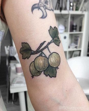 Tiny gooseberry tattoo