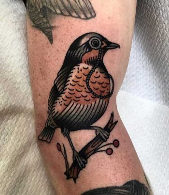 Traditional bird by breeze tattoo