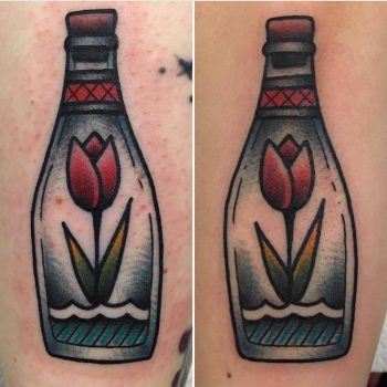 Tulip in a bottle tattoo