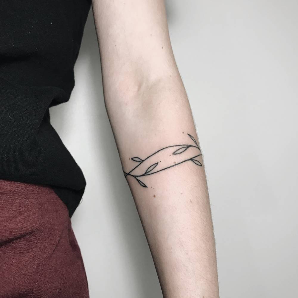 Twig armband tattoo by ann pokes