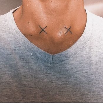 Two x tattoos on the neck