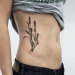 Wheat and lavender tattoo on the rib