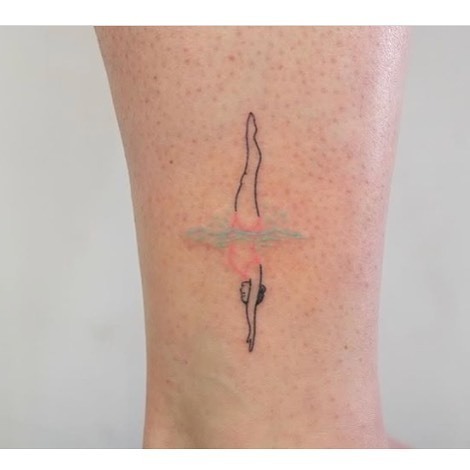 Woman diver tattoo
